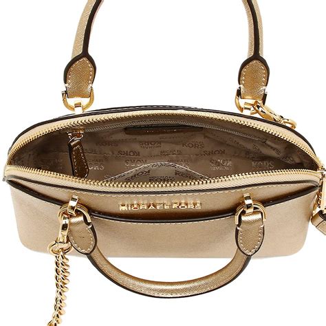 Michael Kors gold crossbody bag